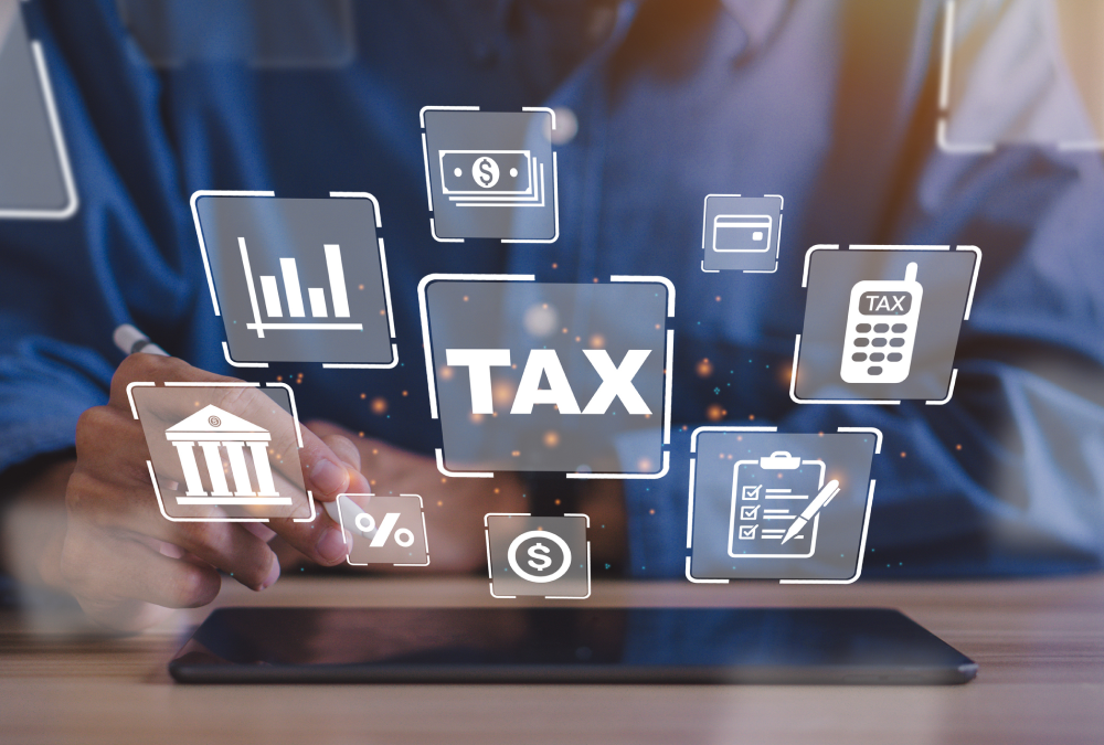 Person analyzing tax information on tablet