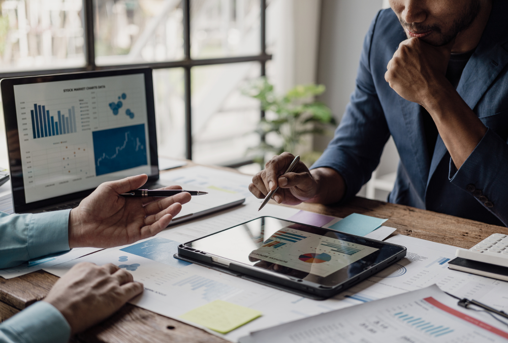 Business meeting with charts and graphs