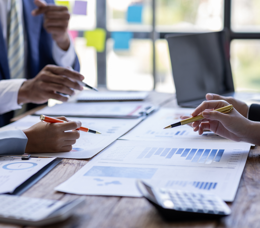 Colleagues discussing graphs and data